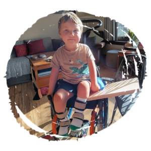 Ben sitting on his new customised wheelchair